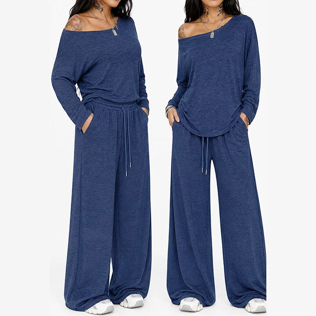 Ensemble t-shirt et pantalon large bleu foncé, porté, double vue sur fond blanc, tatouages visibles, vue de face