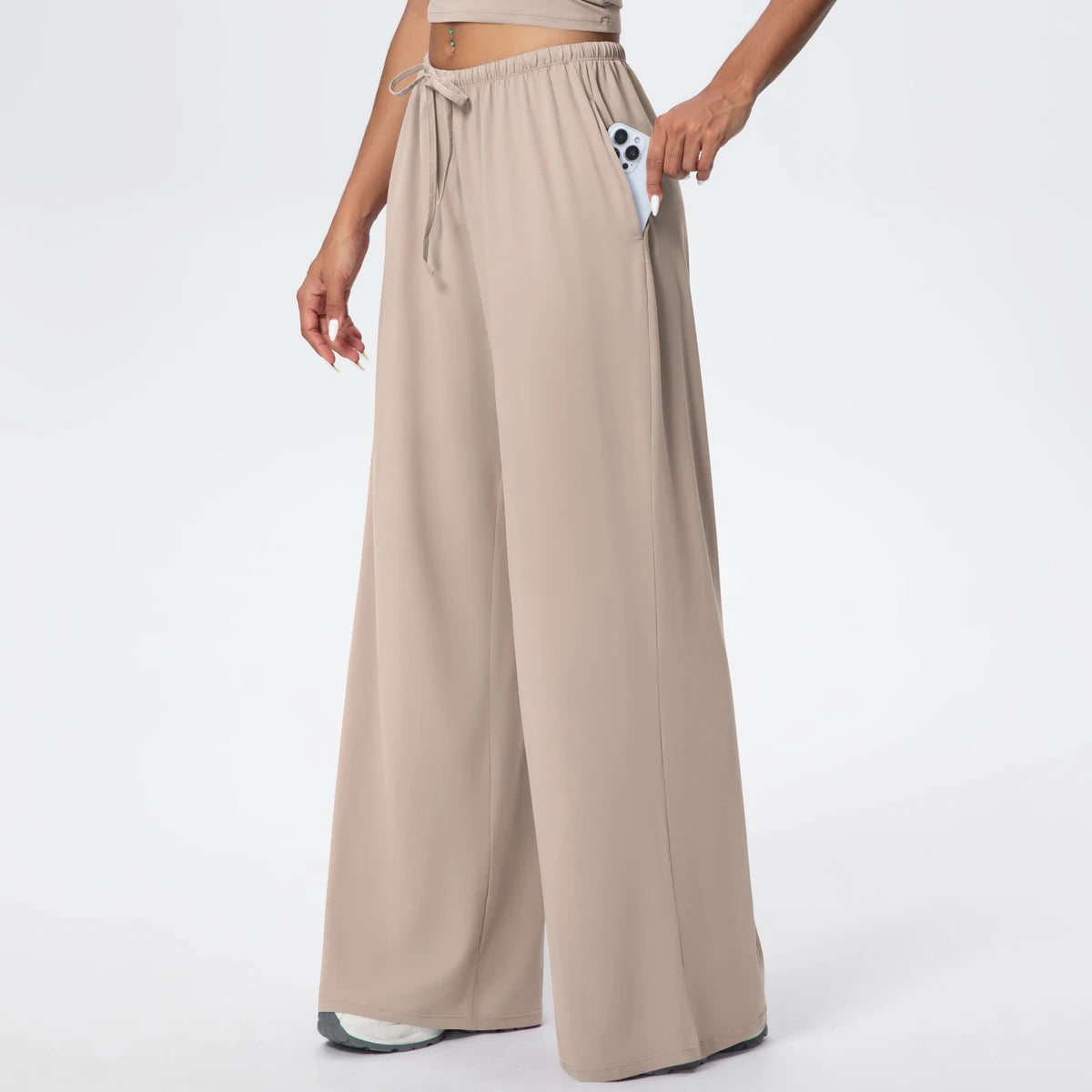 Pantalon de yoga taille haute lin, jambe large à poches, porté, vue de face
