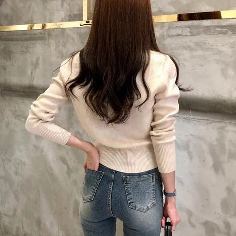 Manteau-cardigan en tricot beige, porté, vue de dos