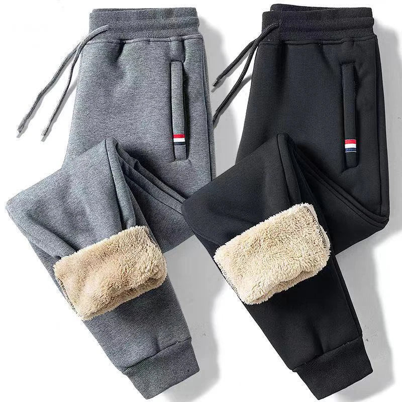 Joggings en coton doublé polaire gris et noir, à plat, doublure polaire visible